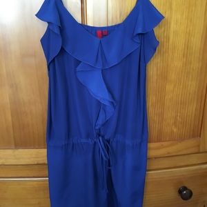 Royal blue romper w/ruffle detail. Size M. EUC